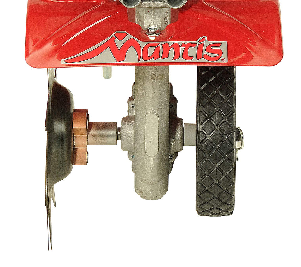 Mantis attachment mounted on tiller in garden demonstrating tidy edge creation benefit