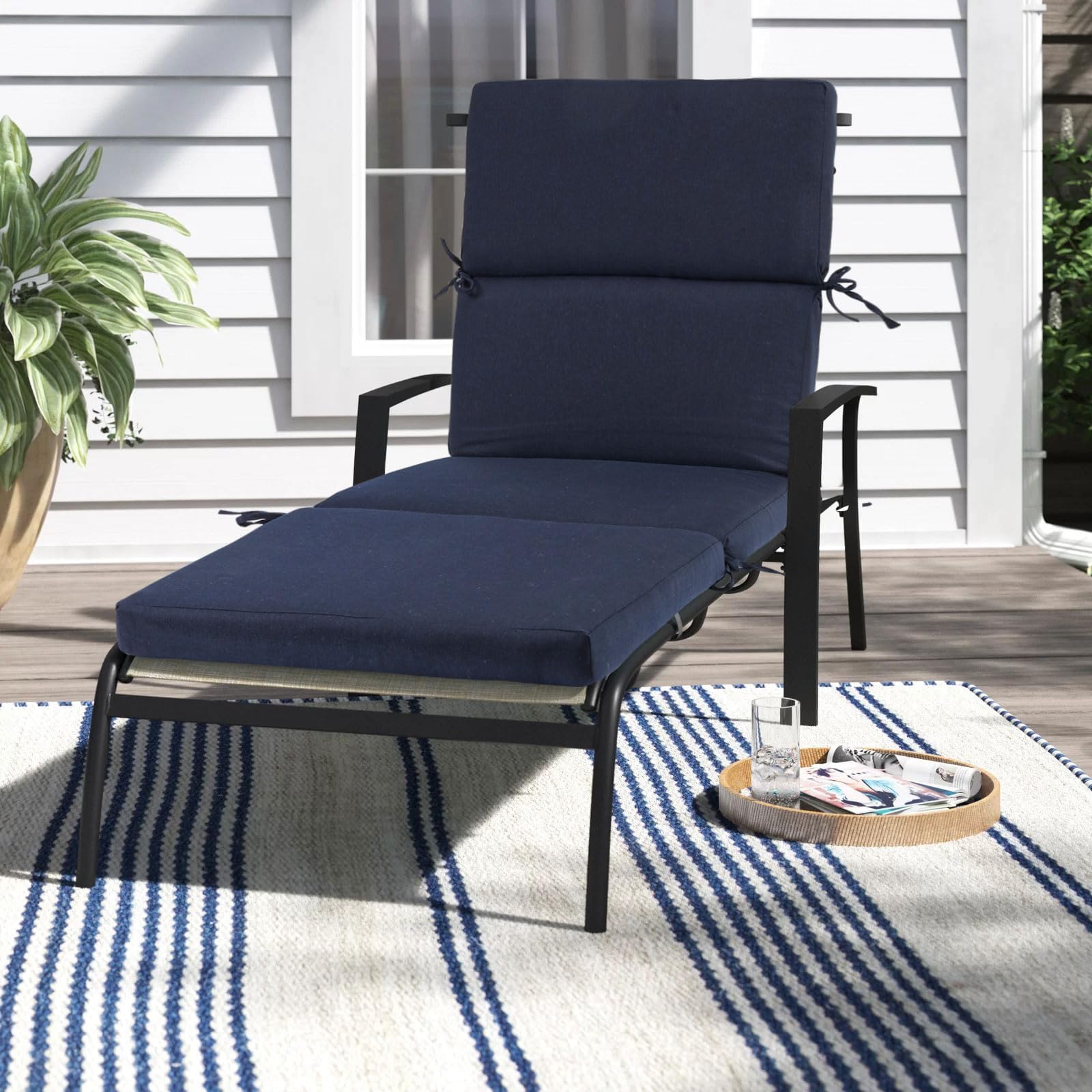 Maphissus size comparison on chaise to show 74x22.5 inch scale and fit