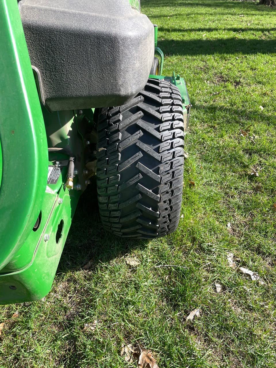 MARASTAR tire beside ruler showing 24x12.00-12 scale for fit verification
