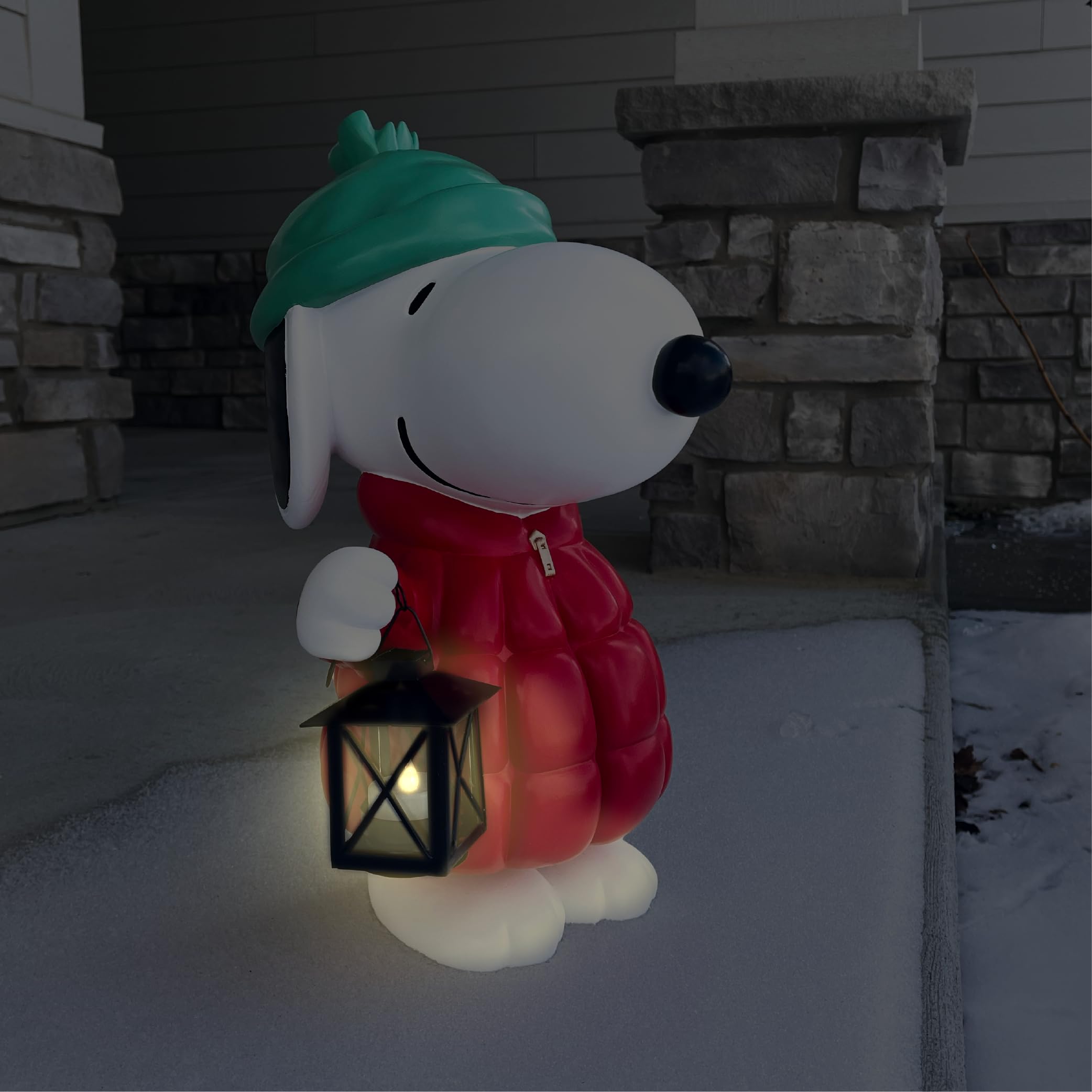 Mark Feldstein Snoopy scale next to door showing 17-inch size benefit: perfect porch fit