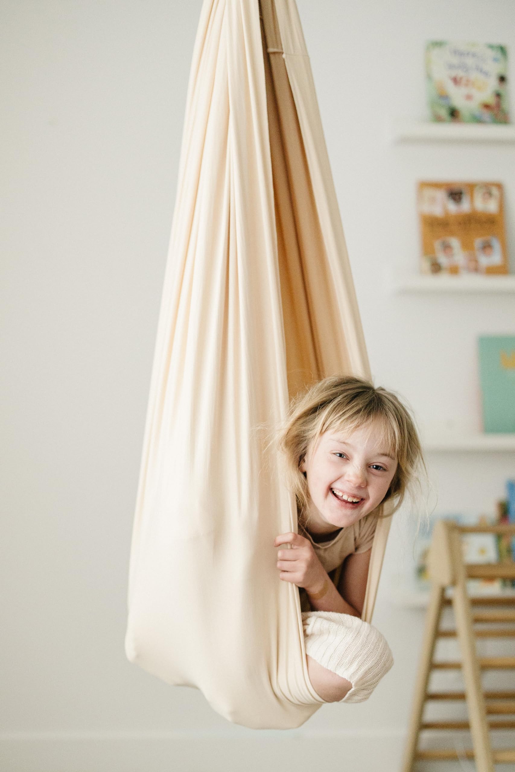 Marlowe & Co installed indoor swing with swivel hardware demonstrating secure setup