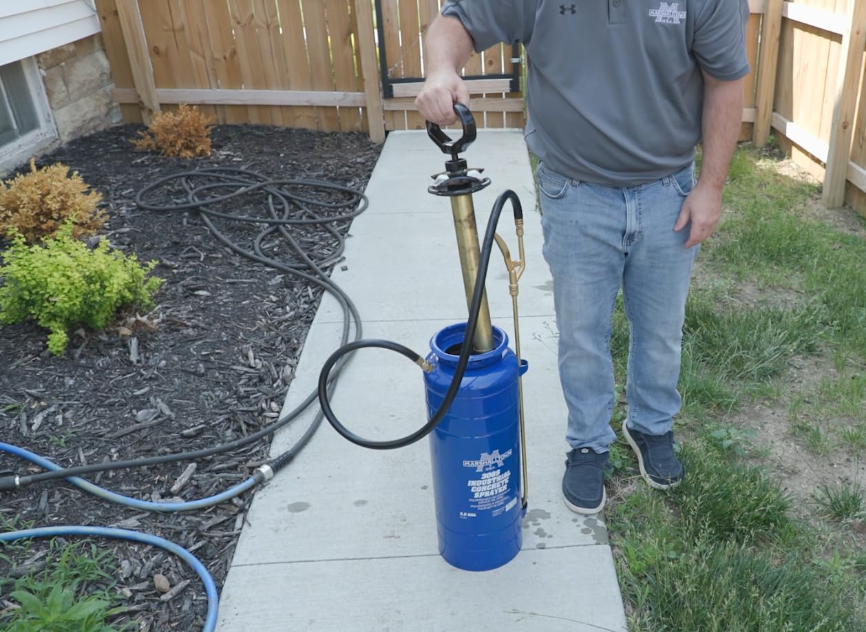 MARSHALLTOWN sprayer applying sealer on concrete for even professional coverage