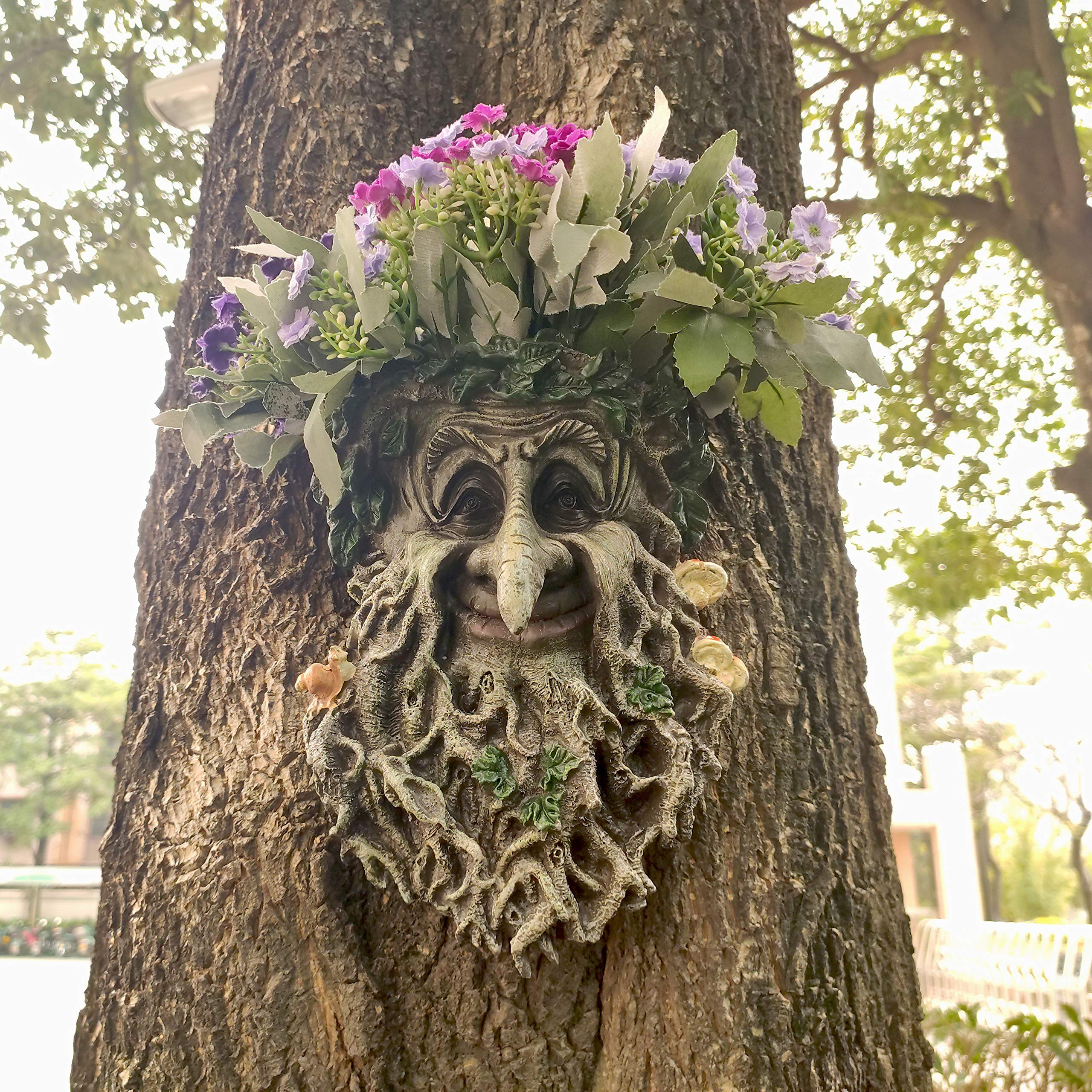 MARYTUMM front view planter showing whimsical tree face and pot benefit of charm