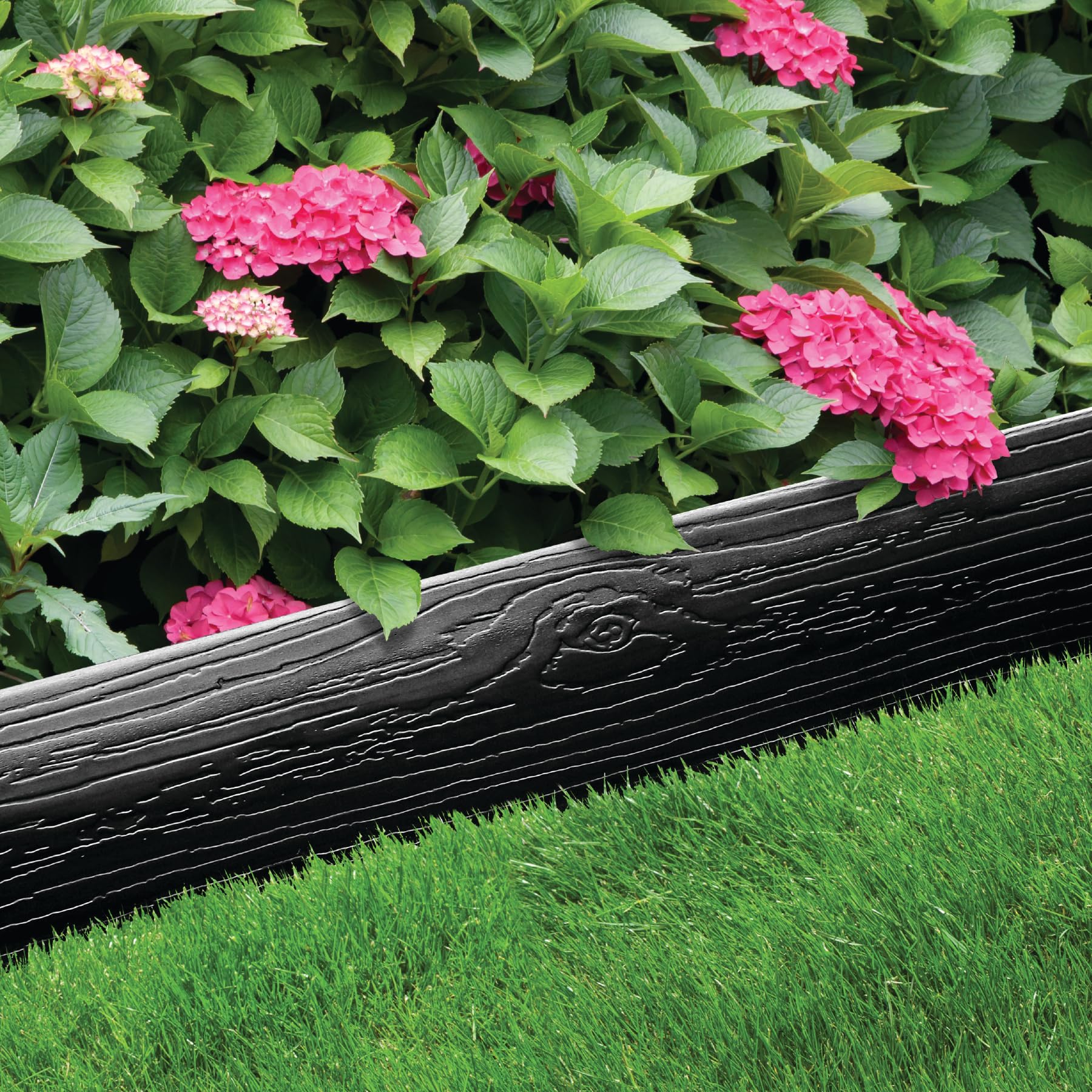 Master Mark installed in flower bed keeping mulch contained and edges tidy