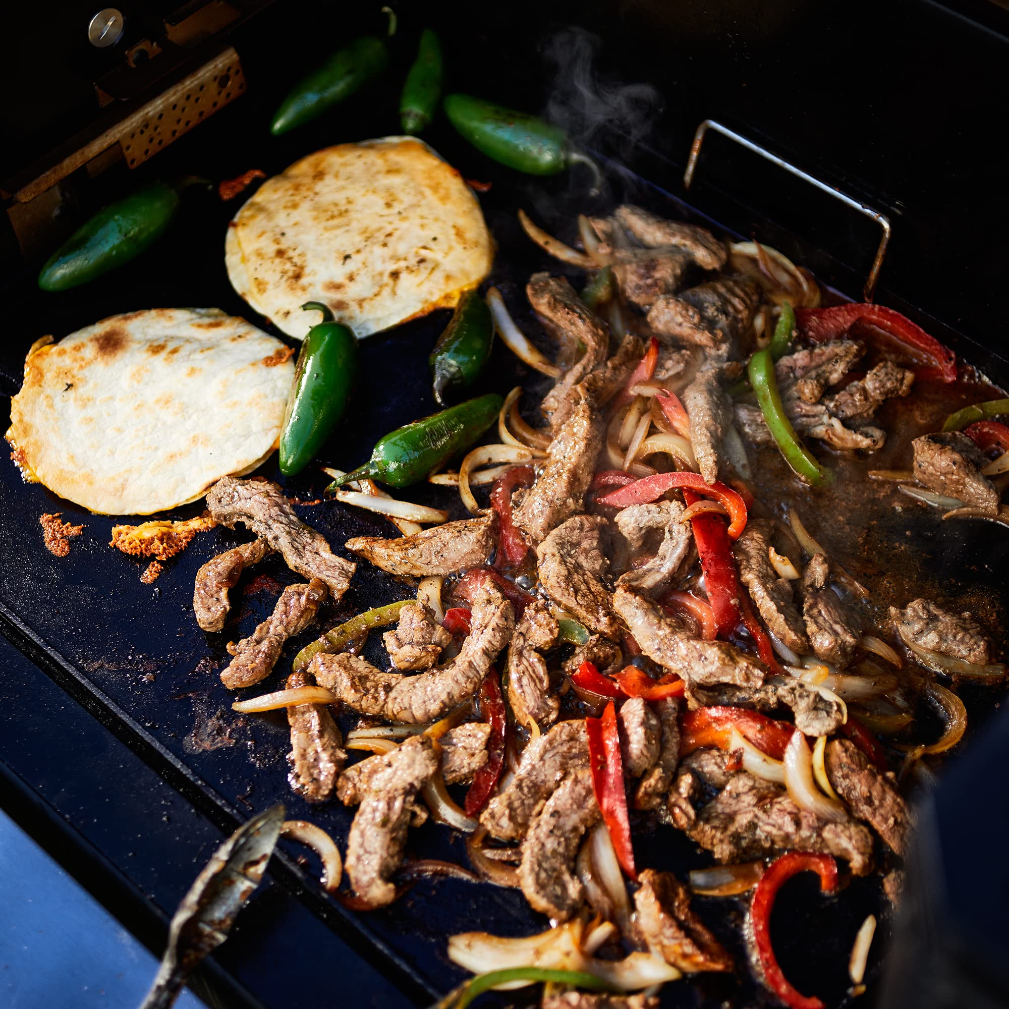 Masterbuilt griddle cooking breakfast spread for large-group serving