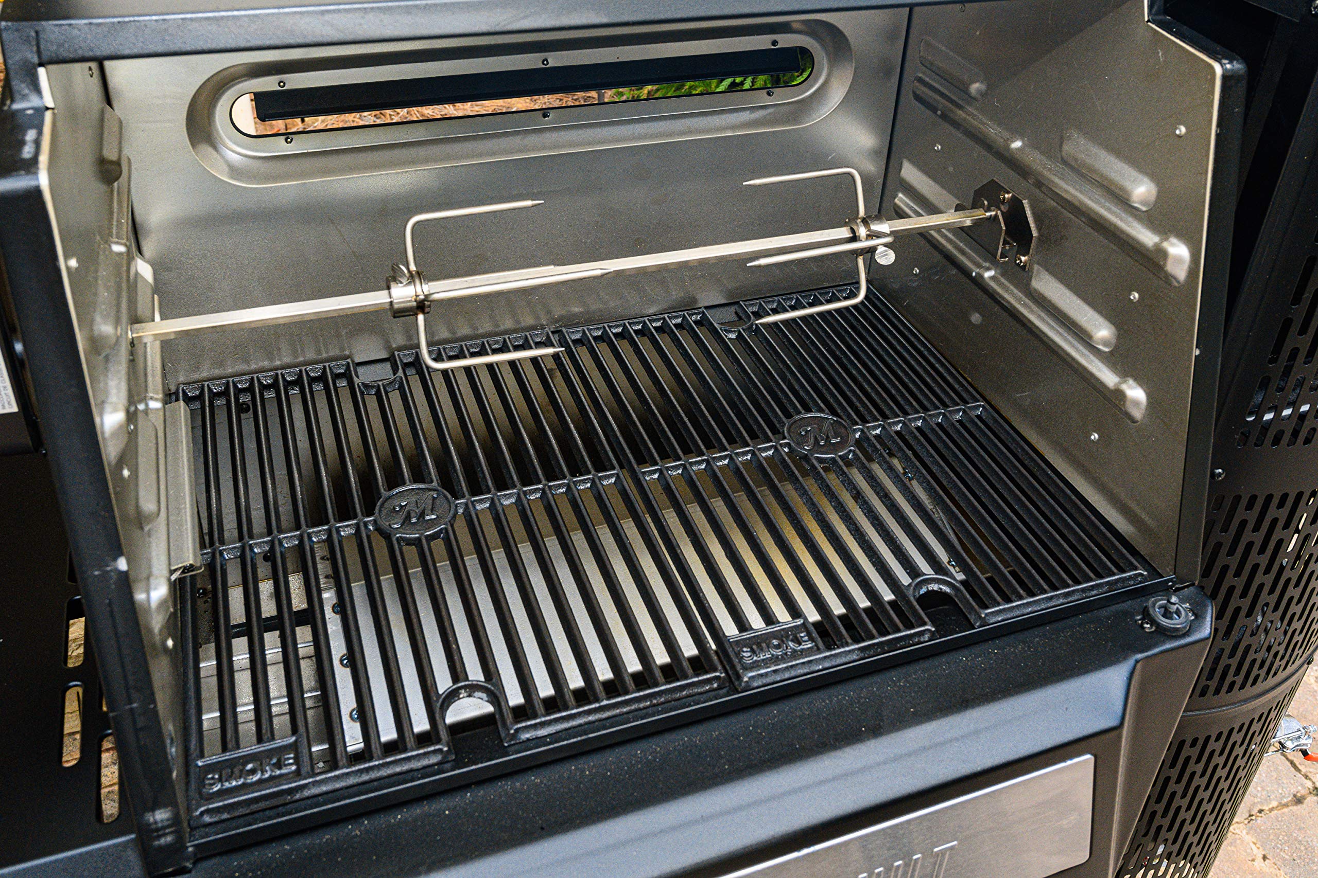 Masterbuilt electric motor housing mounted in grill for steady rotation and hands-free cooking