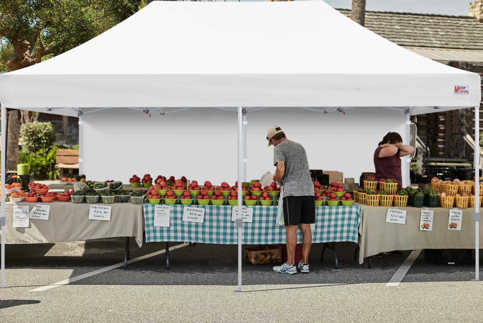 MASTERCANOPY used at a market stall demonstrating shade and wind protection benefits