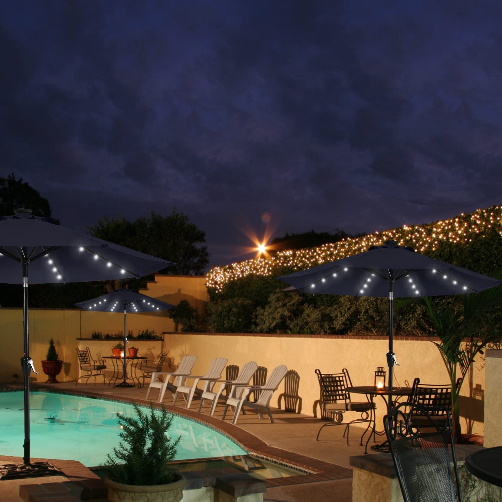 MASTERCANOPY patio evening scene with solar lights enhancing ambiance