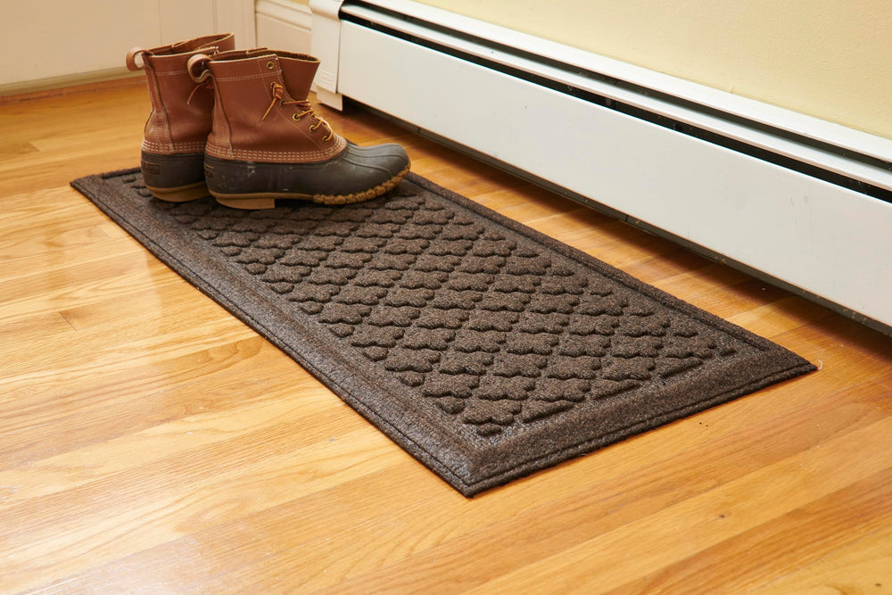 Mats Inc. artisan tray front view showing organized boots and contained mess benefit