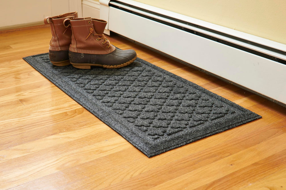 Mats Inc. tray front view showing graphite finish and containment benefits