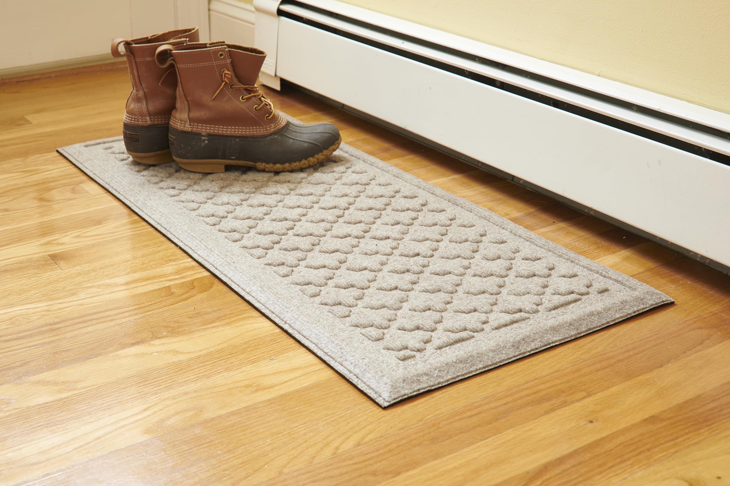 Mats Inc. front view tray catching boots and protecting floor