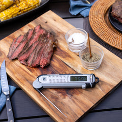 MAVERICK thermometer in use on grill giving fast accurate internal temperatures