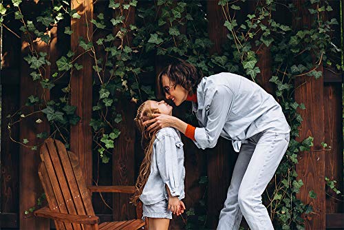 Maxim Enterprise child sitting in chair on lawn illustrating safe outdoor use