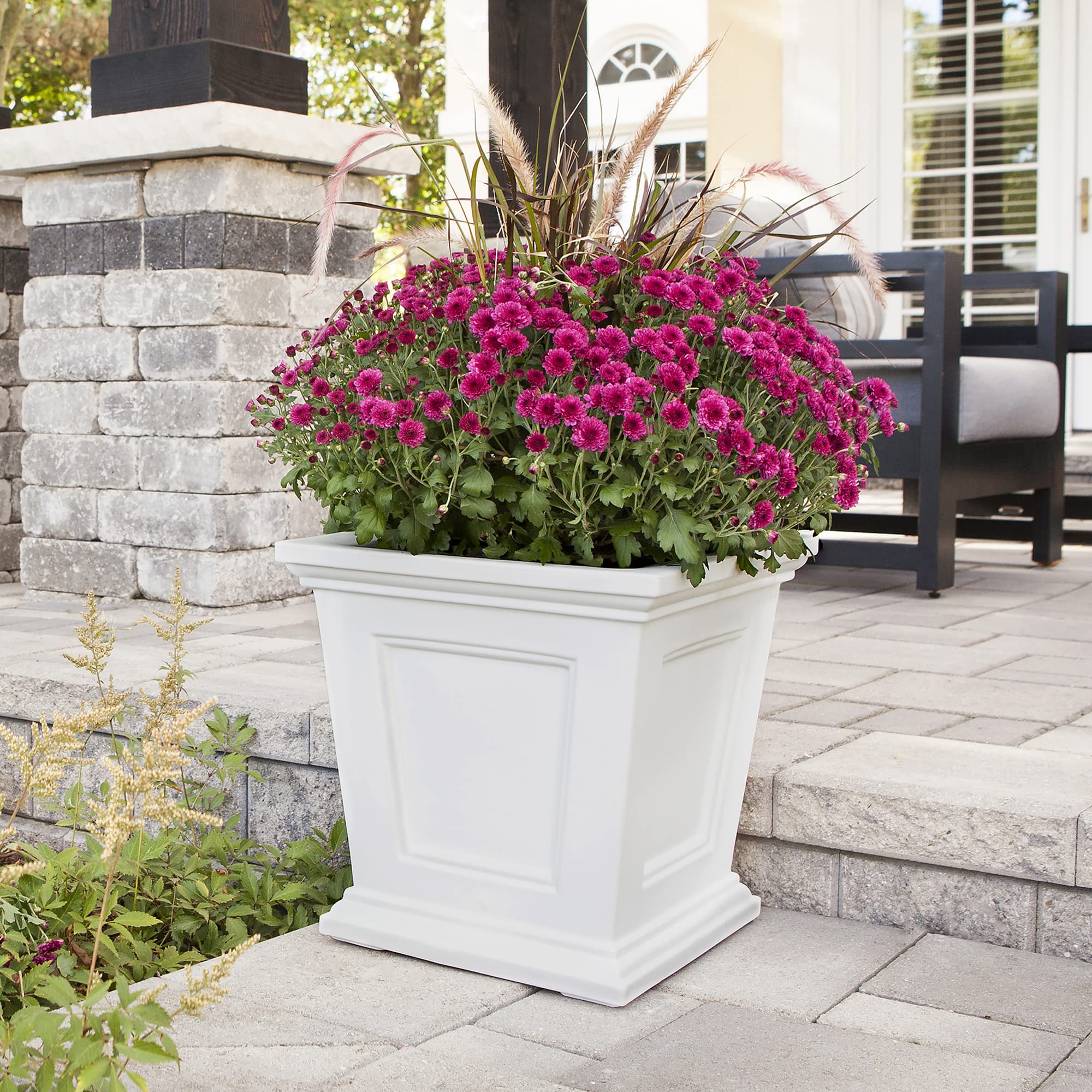 Mayne Fairfield held to scale with hands showing 16-inch size and easy portability benefit