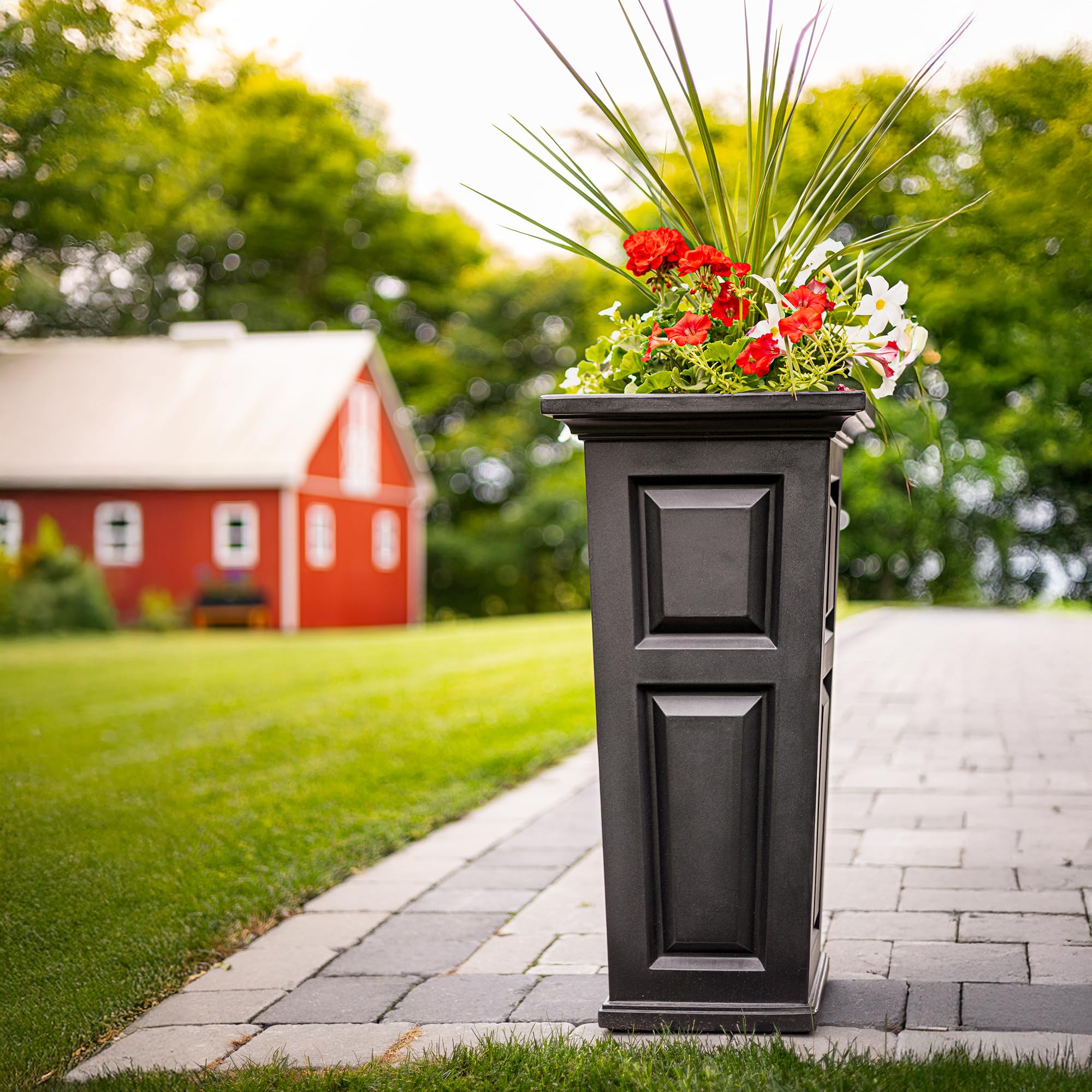 Mayne Nantucket planted in garden demonstrating year-round outdoor use