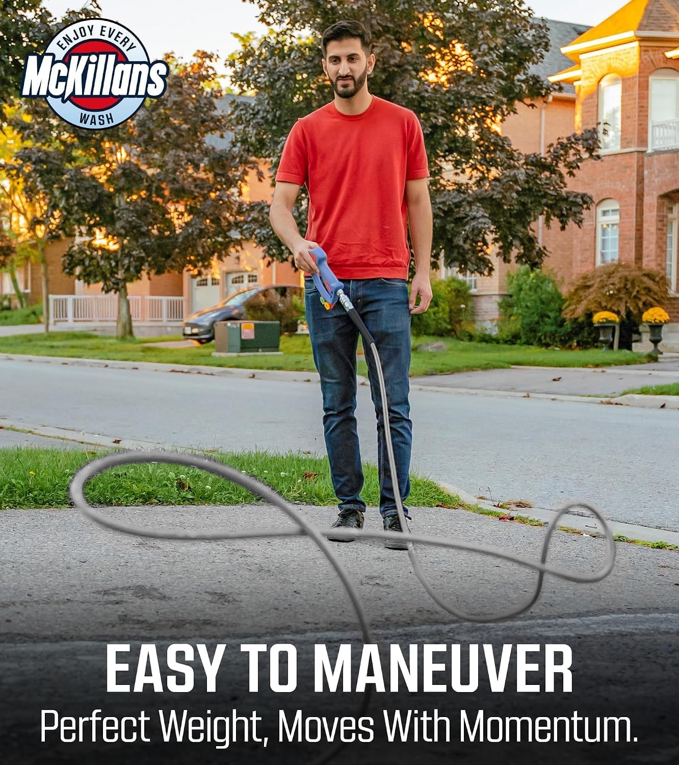 McKillans coiled hose in garage showing easy storage and kink prevention benefit
