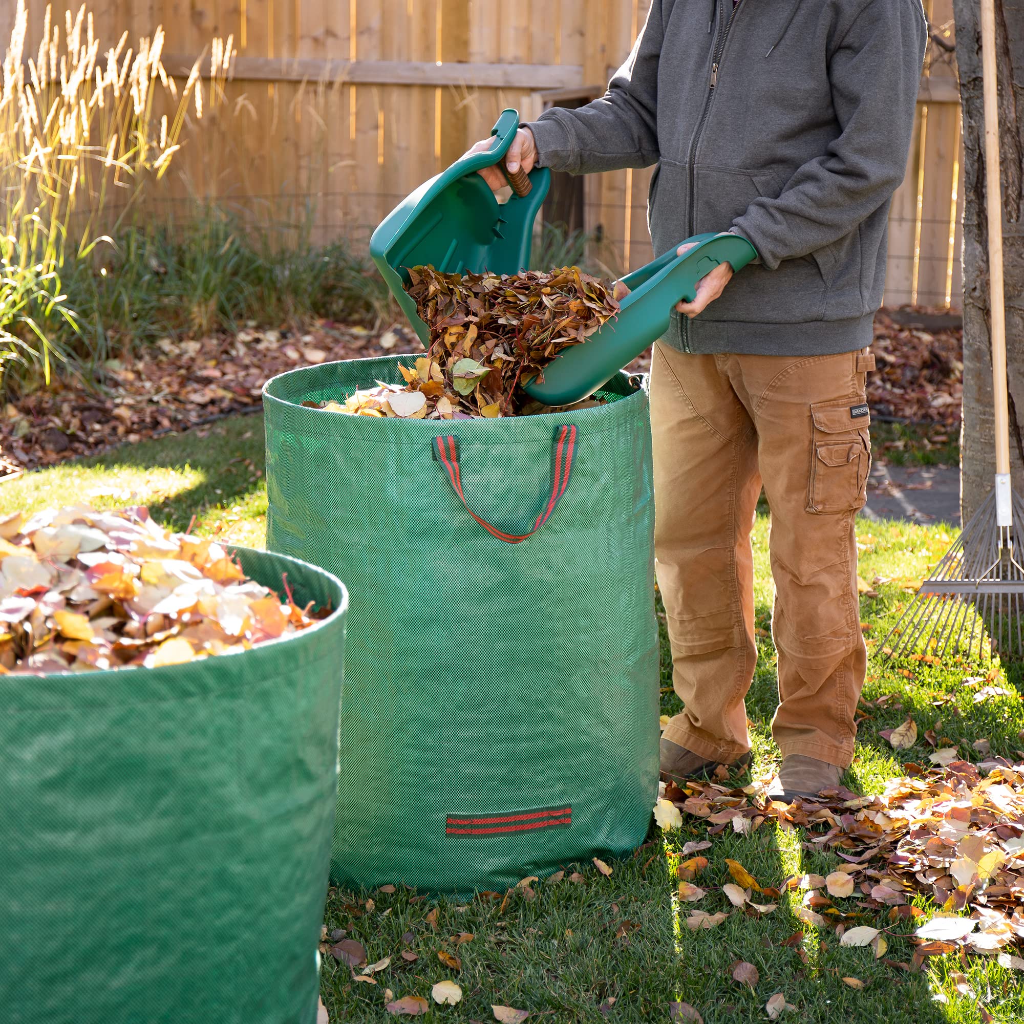 MEKKAPRO dropping debris into paper lawn bag for easy disposal and transfer