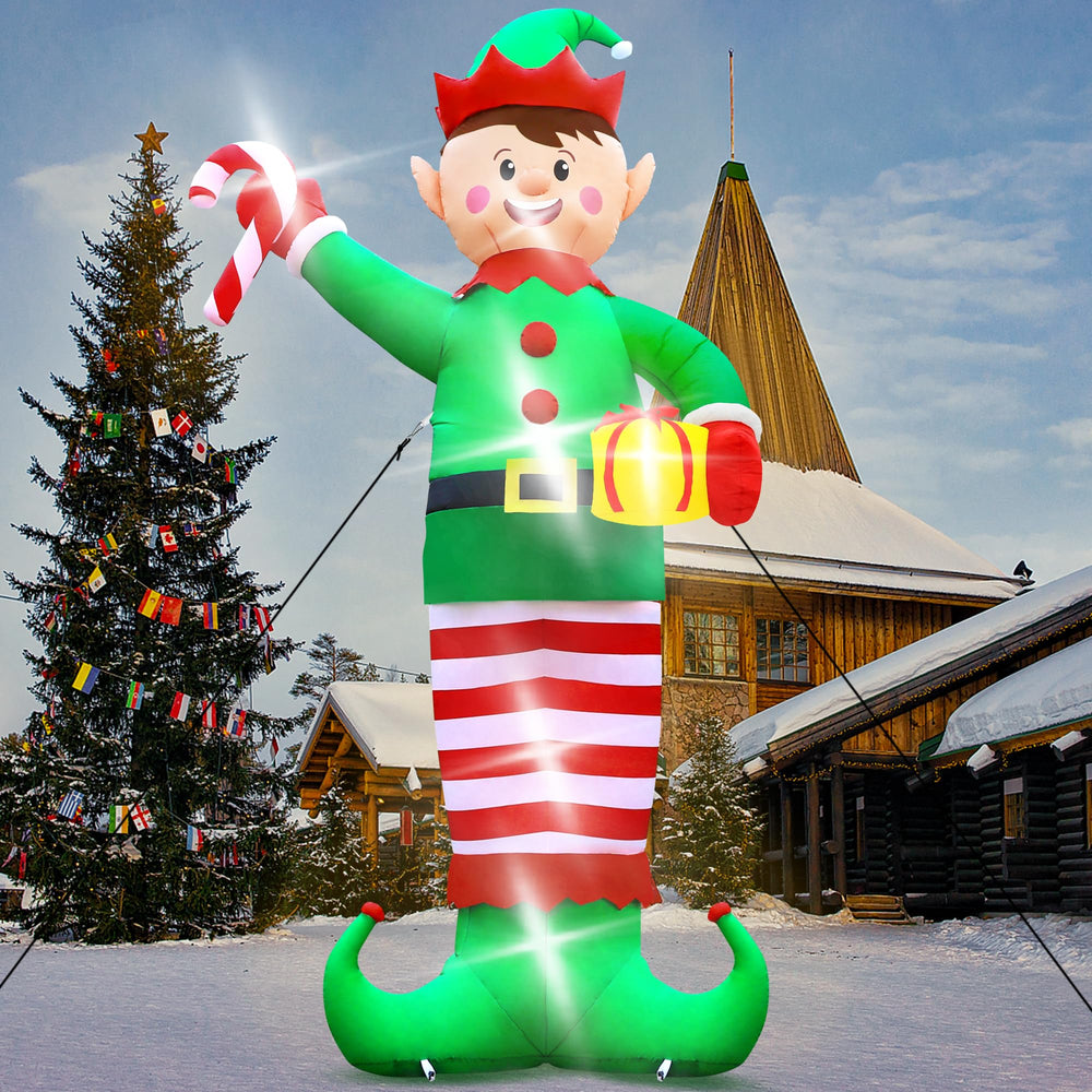 Melisheer inflatable beside house showing 15ft height for scale
