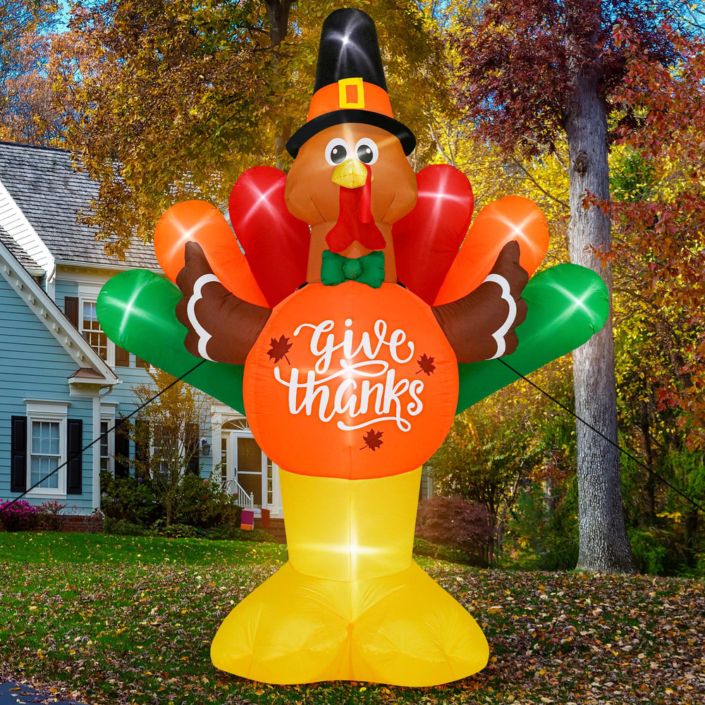 Melisheer family posing with turkey in yard delivering joyful holiday atmosphere