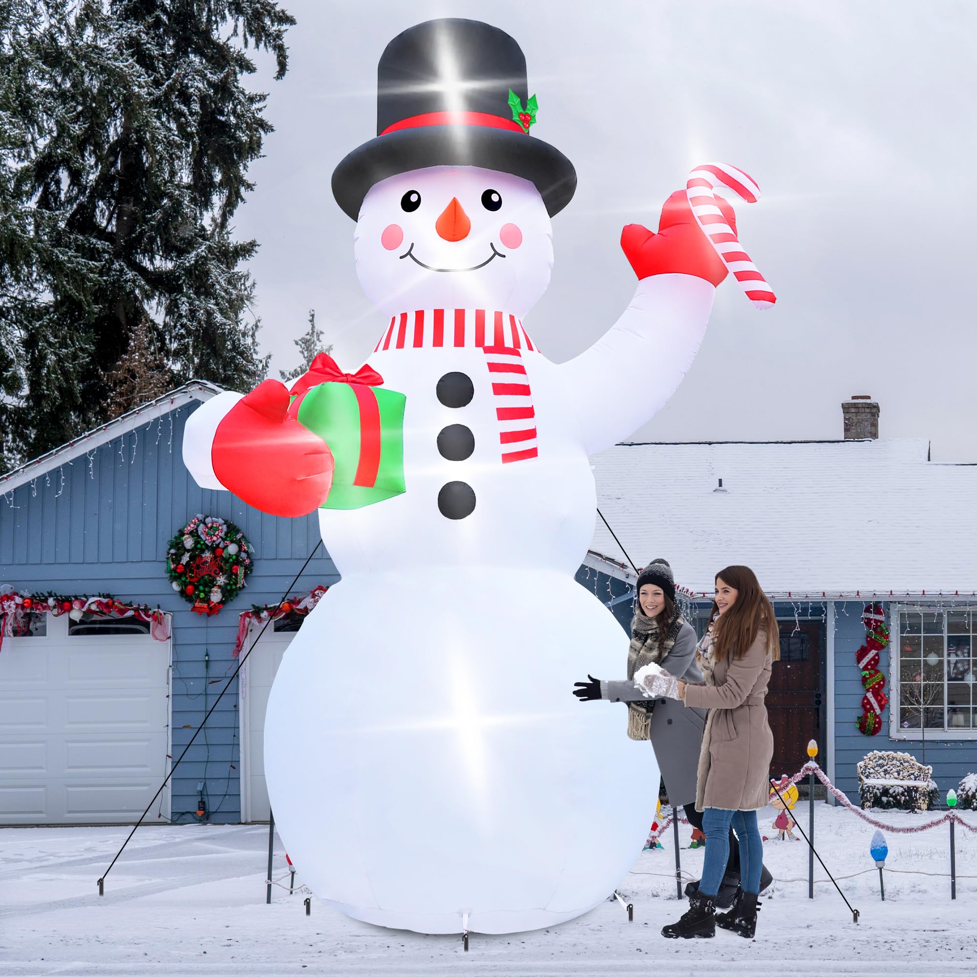 Melisheer snowman in yard with family for holiday photo opportunity