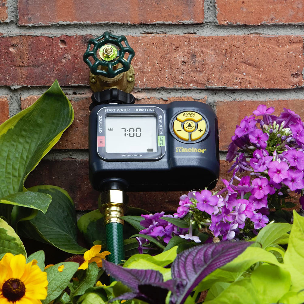Melnor AquaTimer control panel close-up showing display and easy programming
