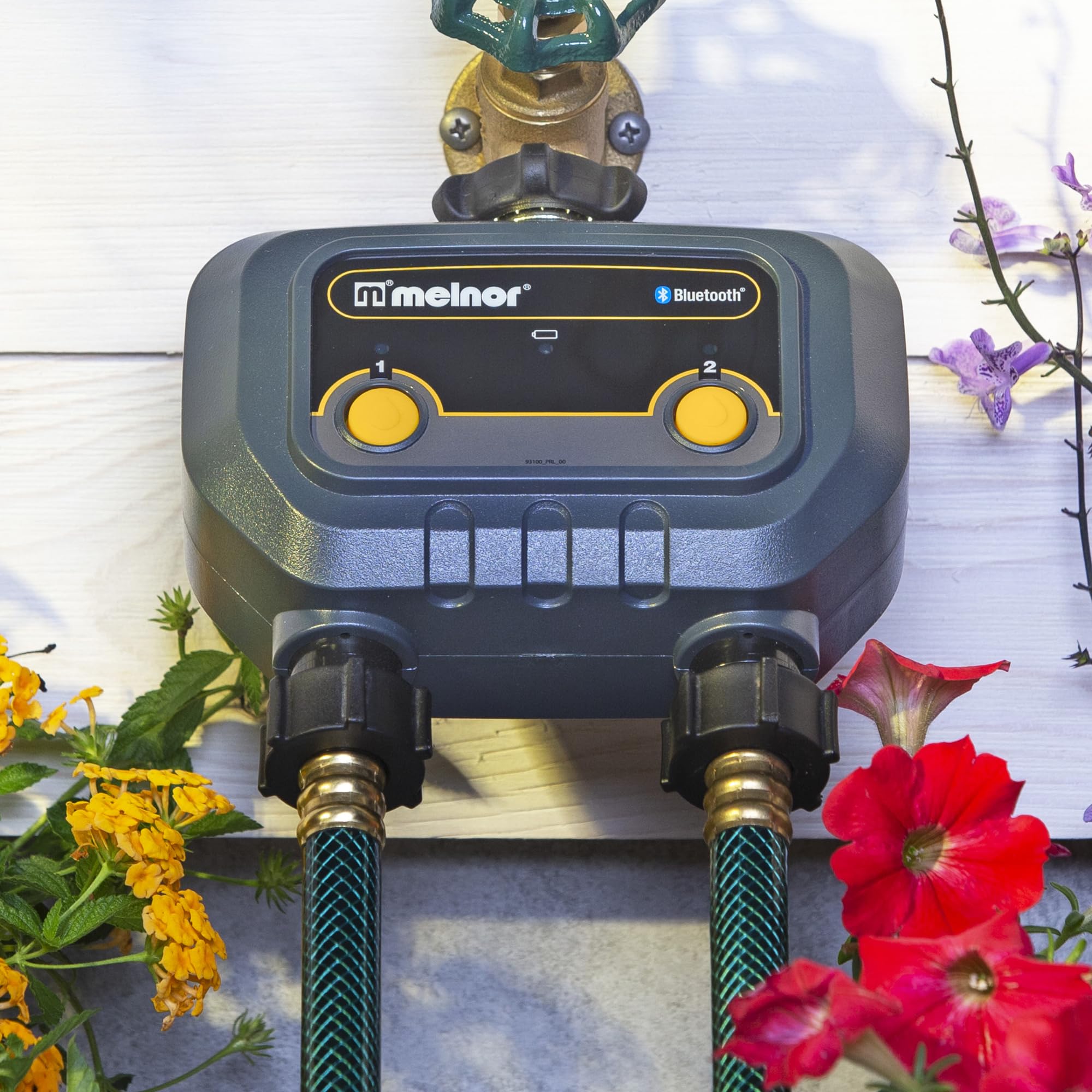 Melnor valve closeup controls showing manual mode and zone switches for instant watering