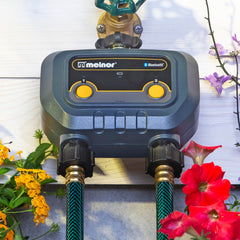 Melnor valve closeup controls showing manual mode and zone switches for instant watering