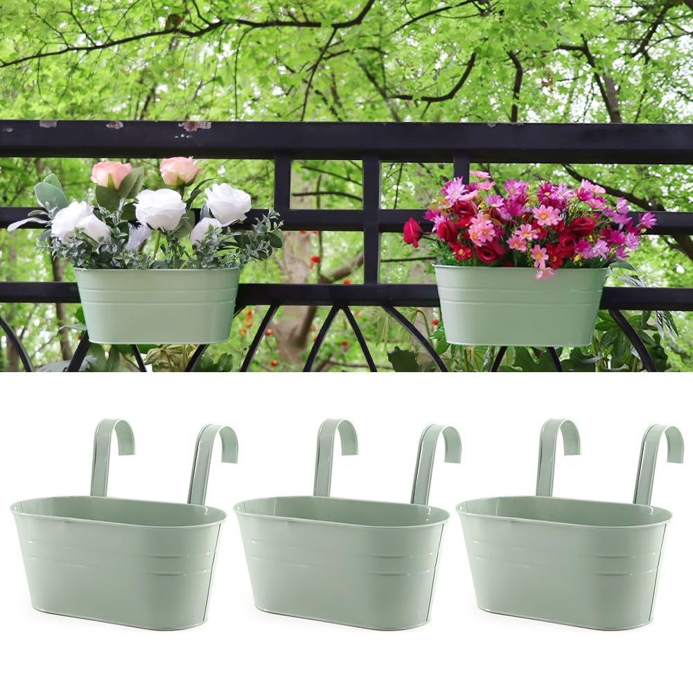 Meltset M front view of blue oval railing planter showing neat floral display