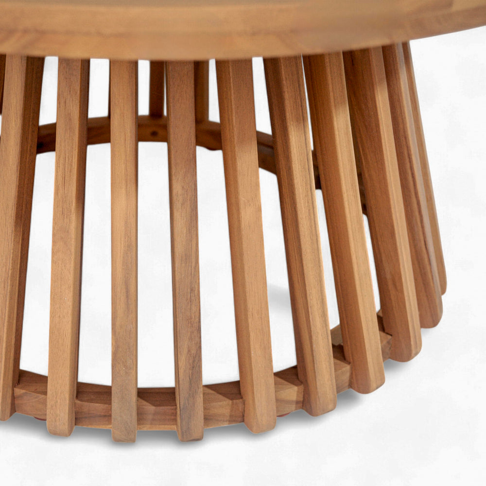 Merax table next to chair for scale showing 31.5 inch diameter and proportion