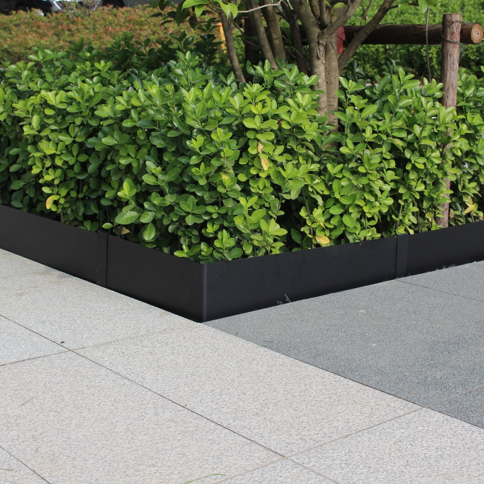 Meyoppm installed edging side profile showing low-profile containment benefit
