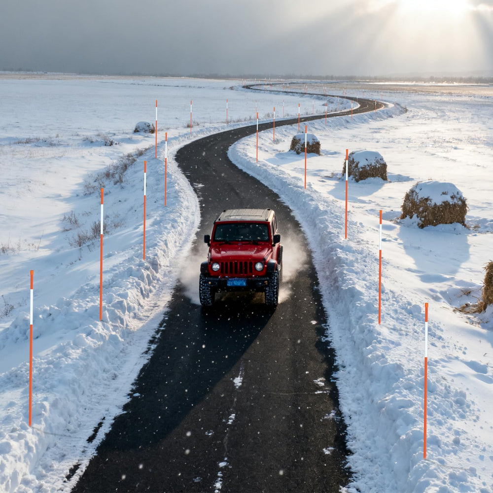 Meyoppm poles marking a snowy driveway to enhance safety