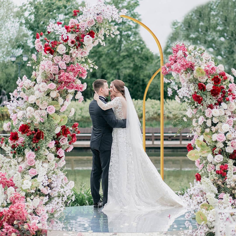 MGPLBYA gold arch decorated with flowers showing styling versatility