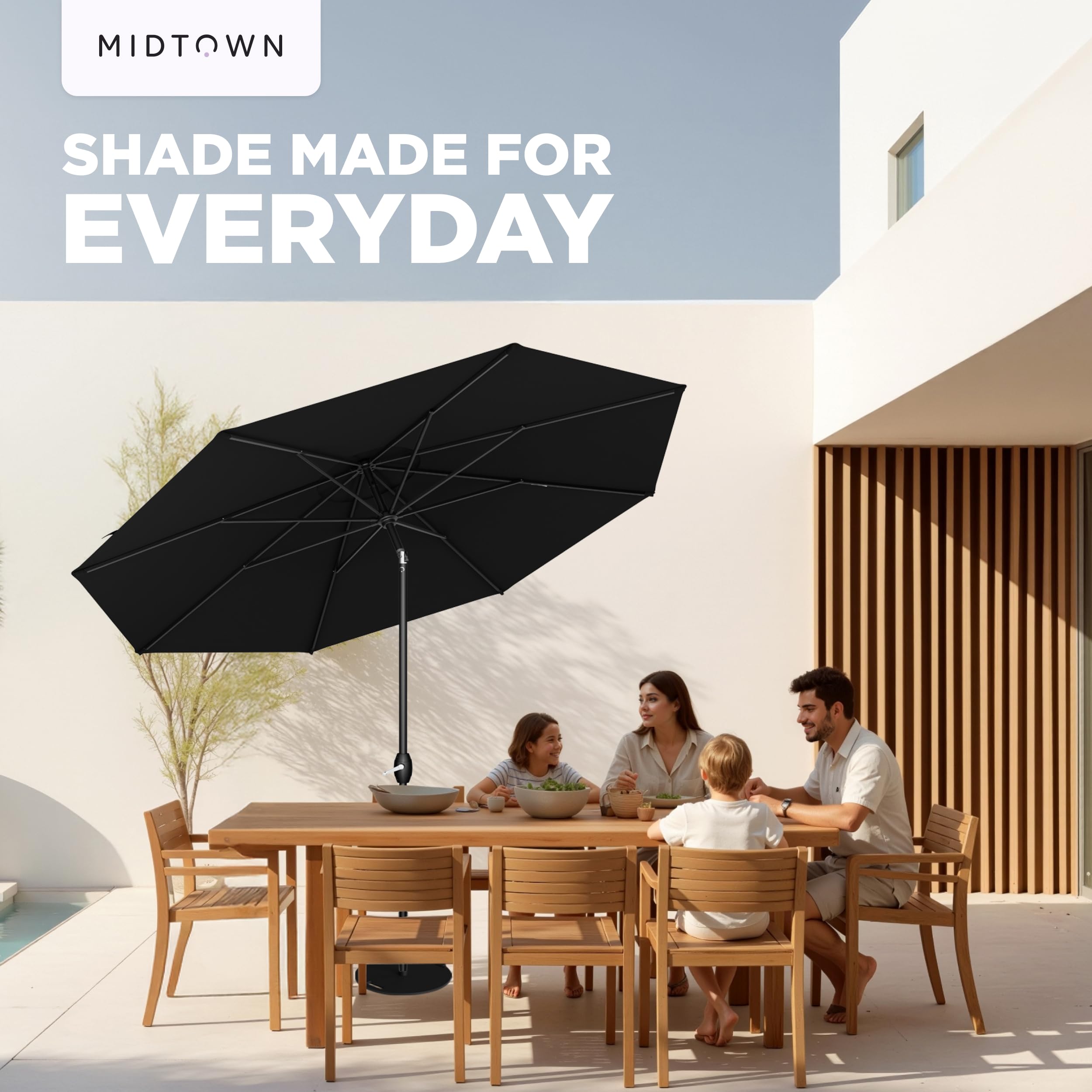 Midtown Umbrellas next to 4-seat table showing scale for small patio spaces