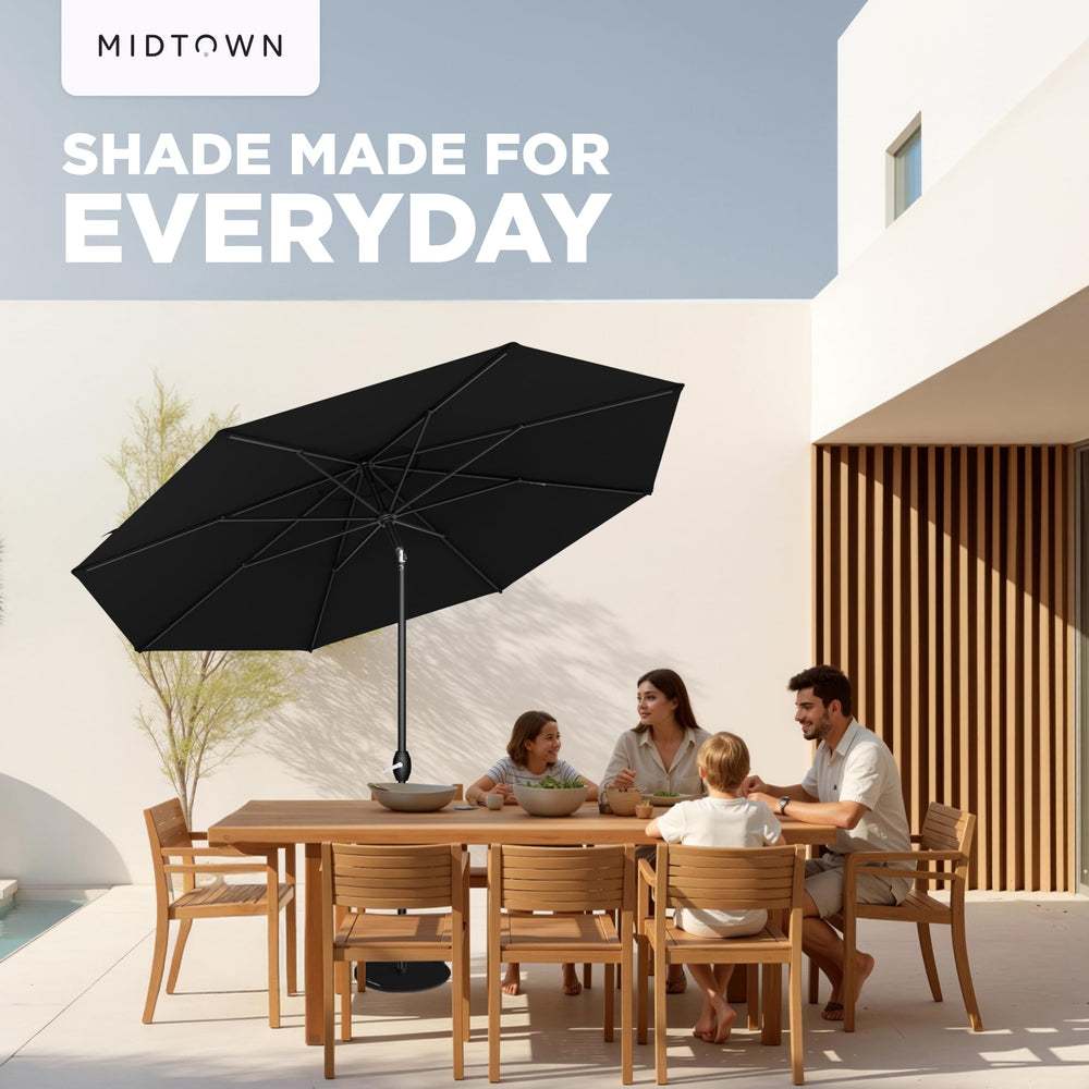 Midtown Umbrellas next to 4-seat table showing scale for small patio spaces