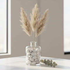 Midwest Hearth stones arranged in clear vase adding bright, clean decorative contrast
