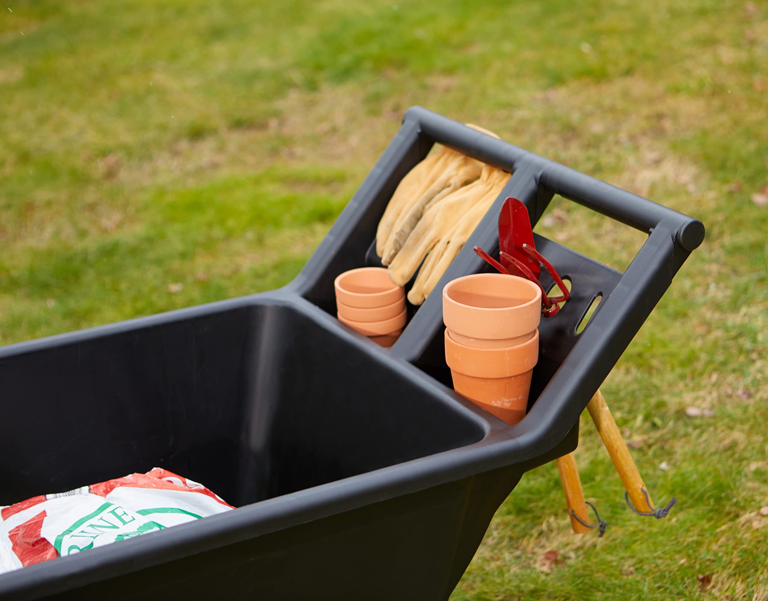 Mighty Tuff material and label close-up highlighting heavy-duty plastic durability