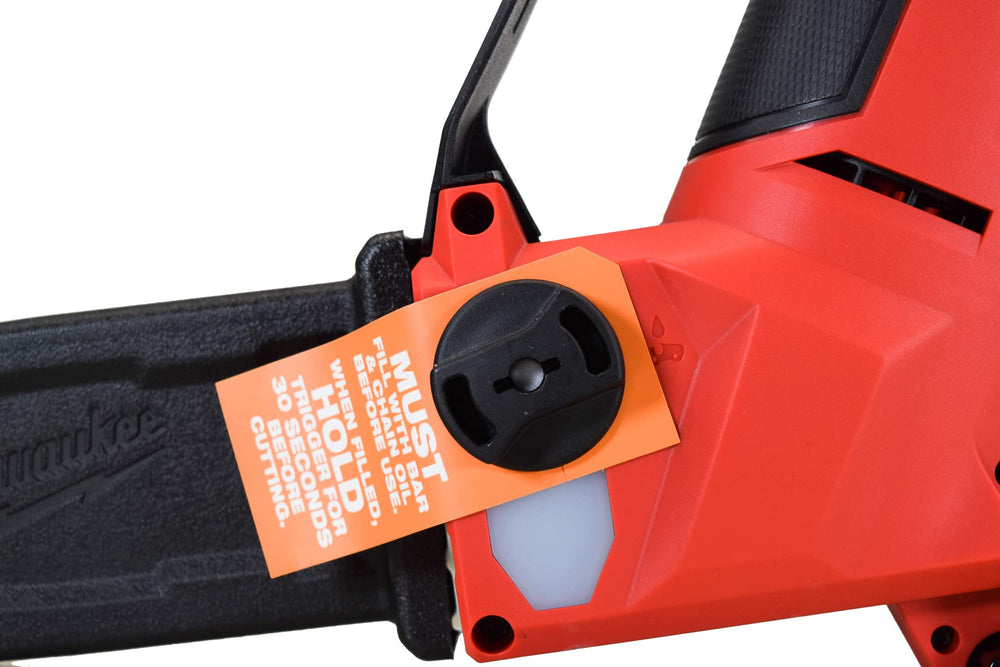 Milwaukee saw beside an M18 battery showing compact scale and portability benefit