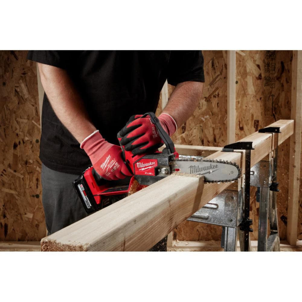 Milwaukee hatchet in use by climber demonstrating secure handling and aerial tie-off benefit