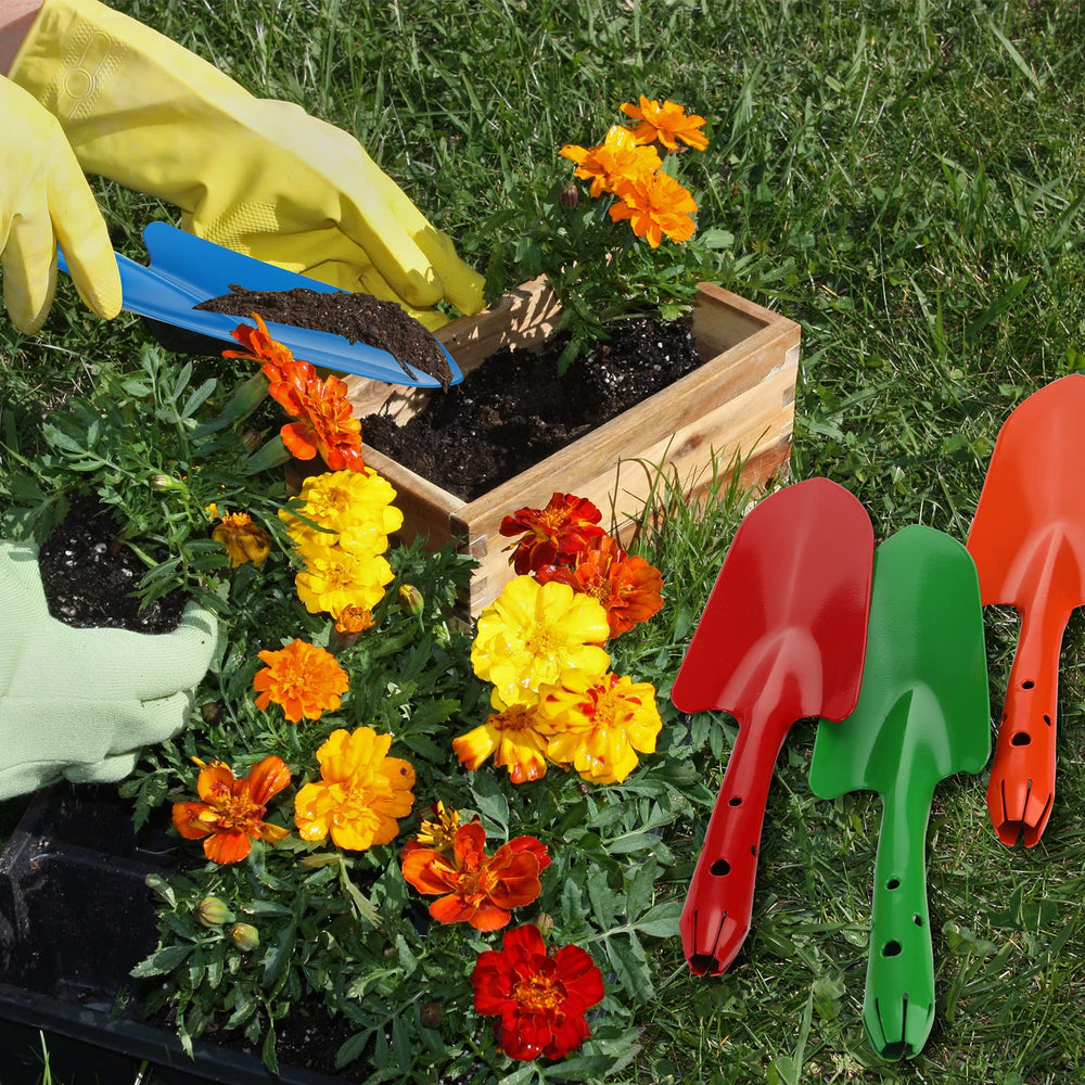 Minatee trowels arranged on garden table suggesting group activity and convenience