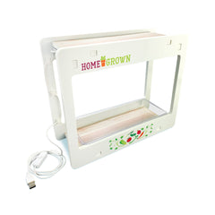 MindWare bottom tray with seed pots containing water spill protection benefit