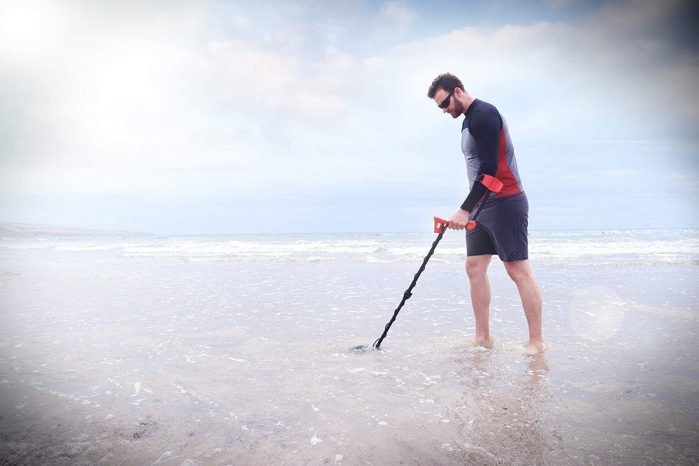 MINELAB Vanquish 340 in use on a beach demonstrating Multi-IQ performance and shallow-water capability