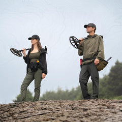 MINELAB Vanquish 360 wading in shallow water demonstrating waterproof capability