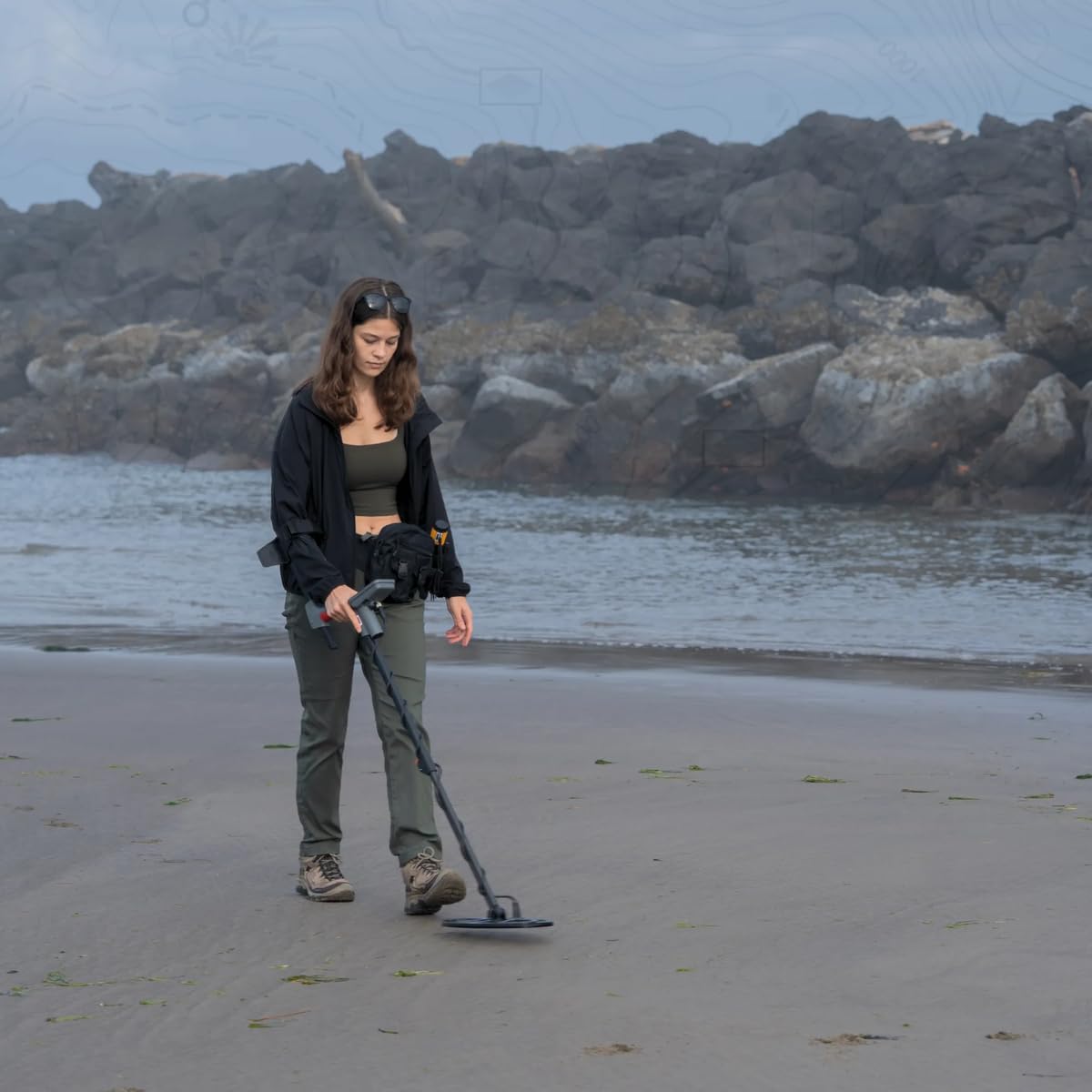 MINELAB wired headphones beside detector showing included accessories for clear audio feedback