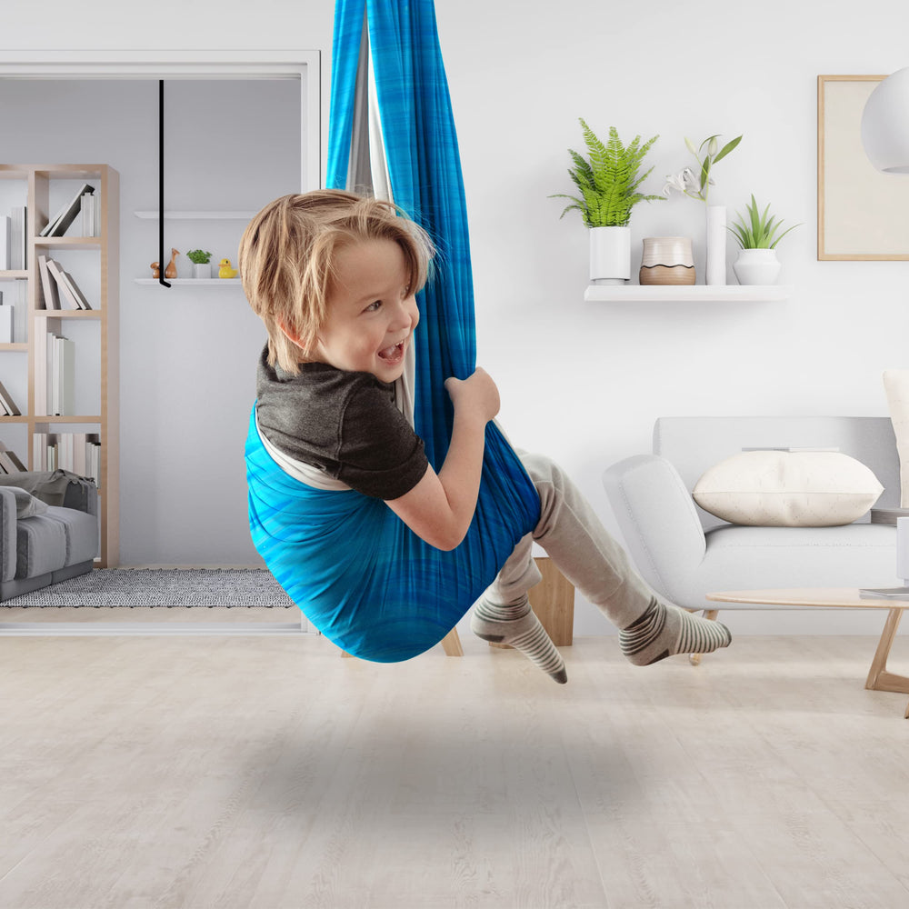 Minglewood sensory swing in playroom setting showing cozy calming corner