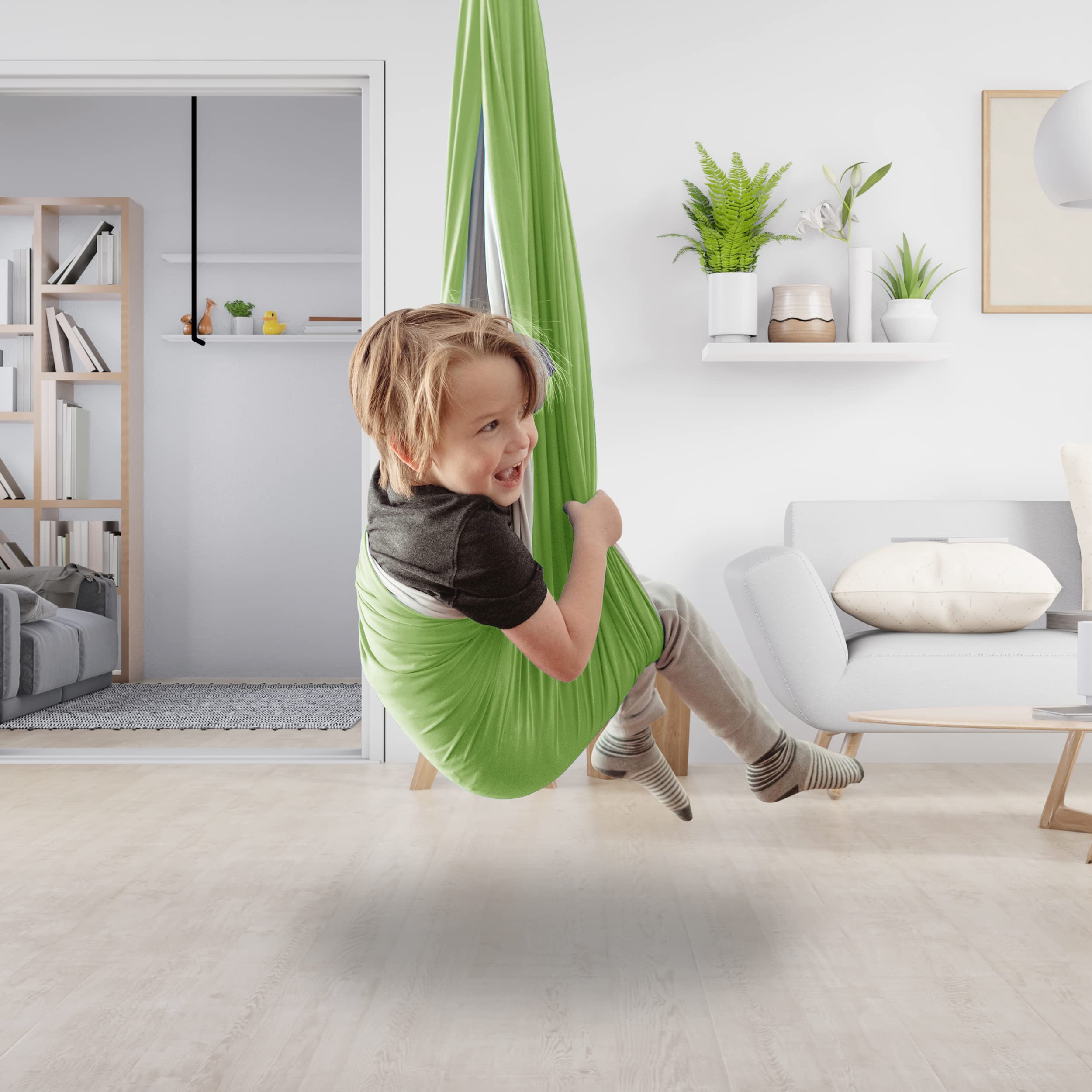 Minglewood swing beside child for scale, generous size supports various ages