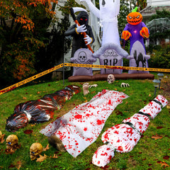 MiniInflat hanging on tree with ropes and tape creating eerie outdoor yard display