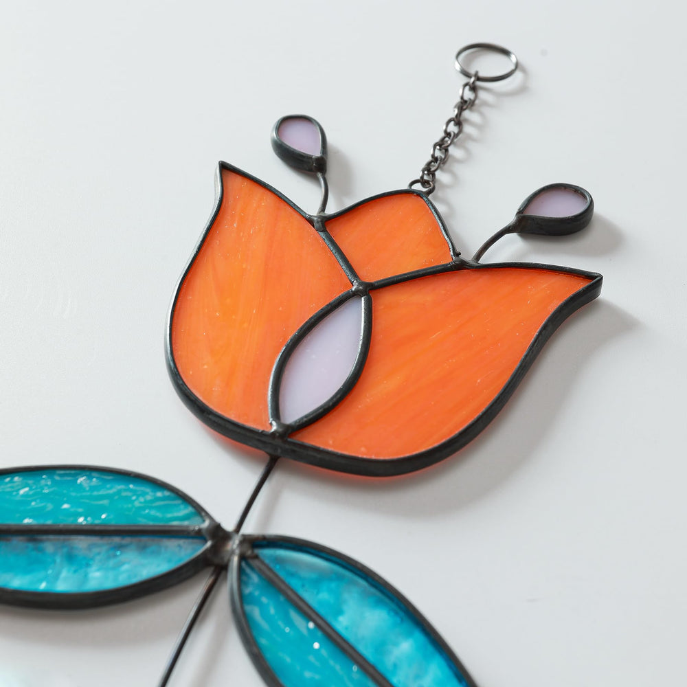 MintyWiz tulip hung in sunny window casting colorful light and cheerful ambiance