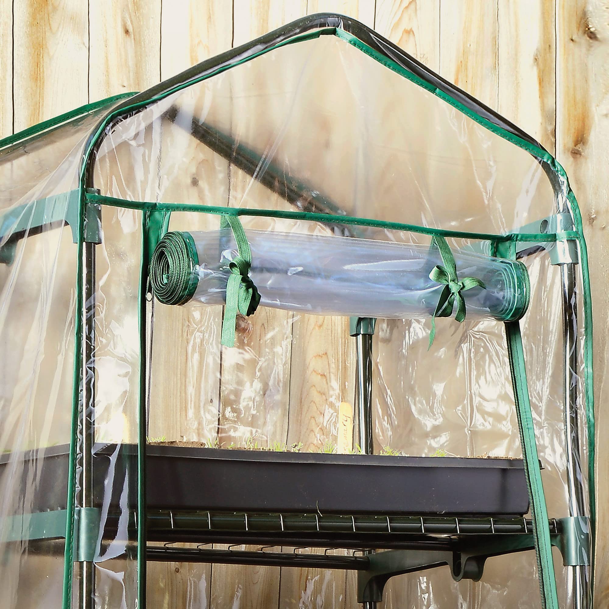 Miracle-Gro greenhouse in balcony setting maximizing limited outdoor space