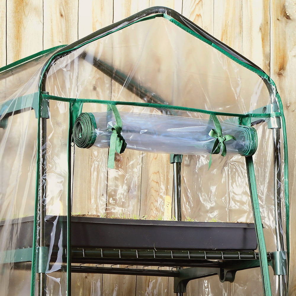 Miracle-Gro greenhouse in balcony setting maximizing limited outdoor space