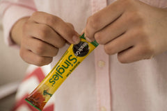 Miracle-Gro close-up of a single packet highlighting pre-measured simplicity